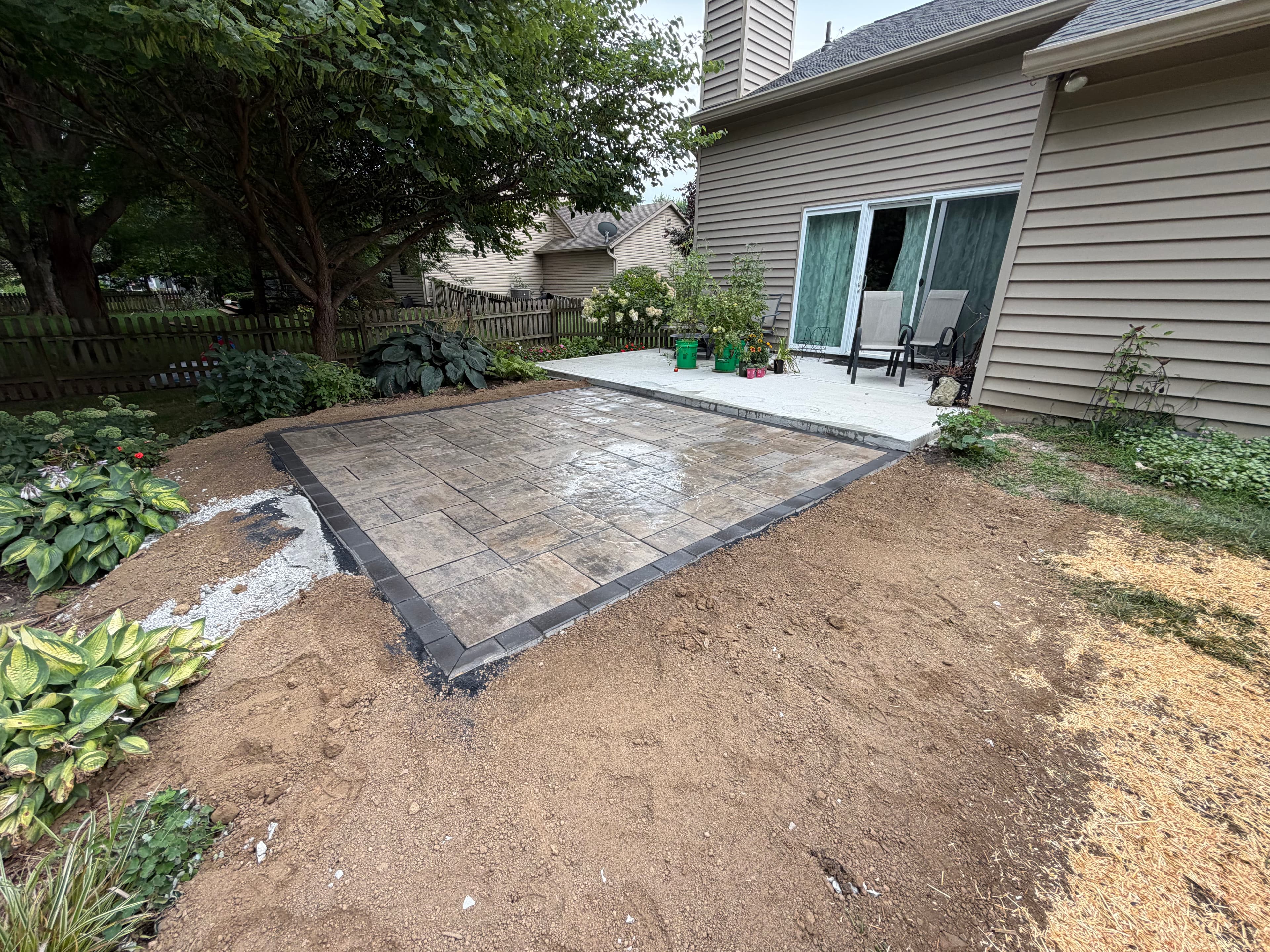 Project Patio Extension Done Right - Pavers Beat Plain Concrete Every Time image