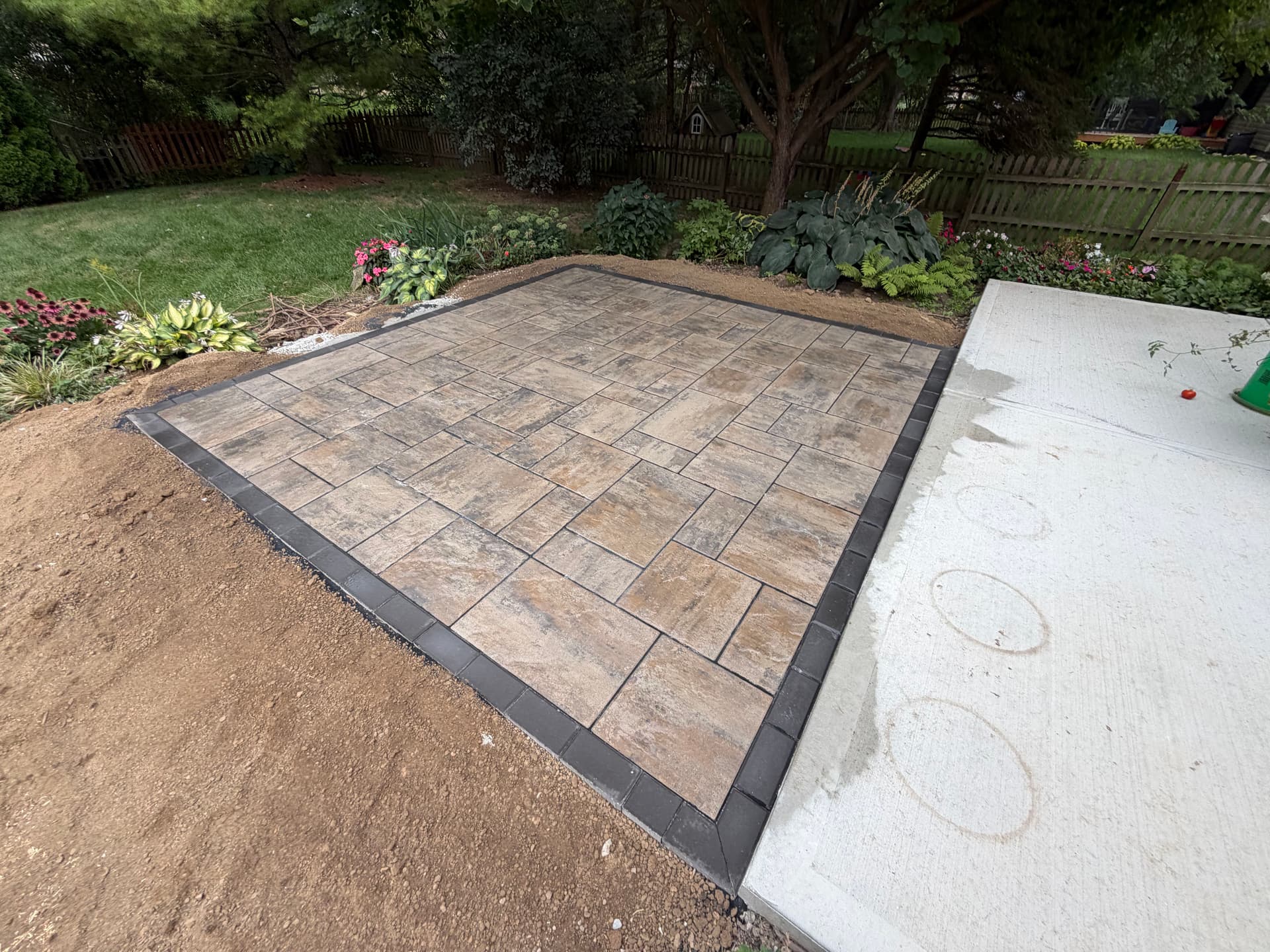 Gallery photos for Patio Extension Done Right - Pavers Beat Plain Concrete Every Time: Image #1