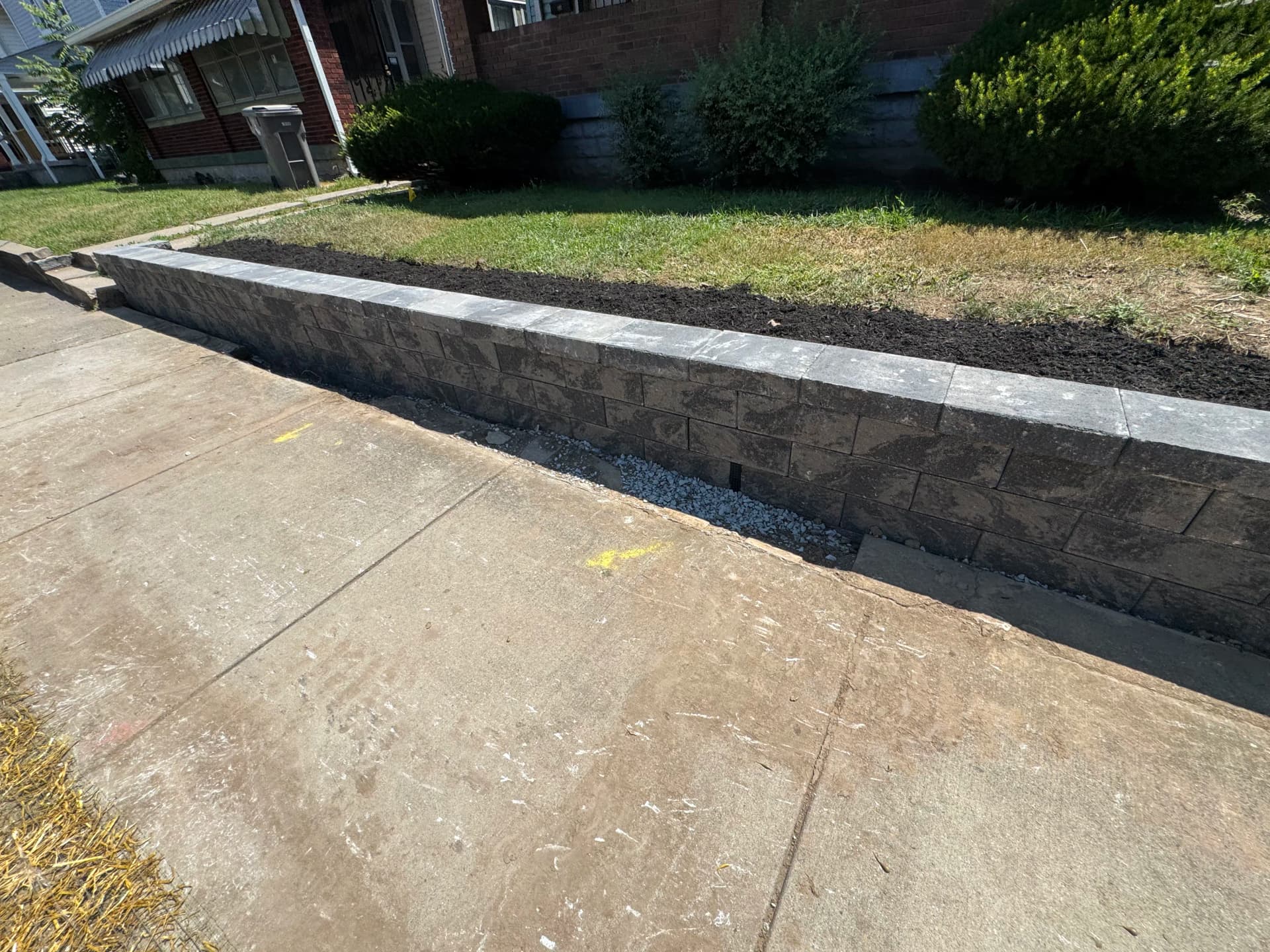 Gallery photos for New Block Retaining Wall Keeps This Front Yard From Washing Away: Image #1