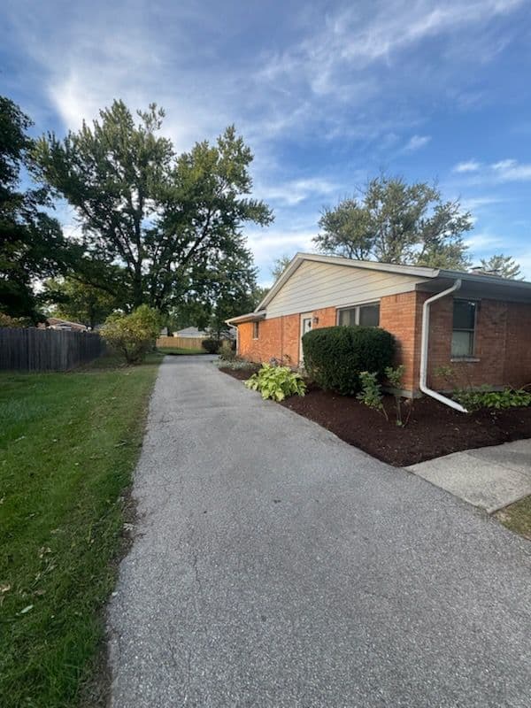 Project Revitalized Front Yard Makeover for a Distinctive Brick Home image