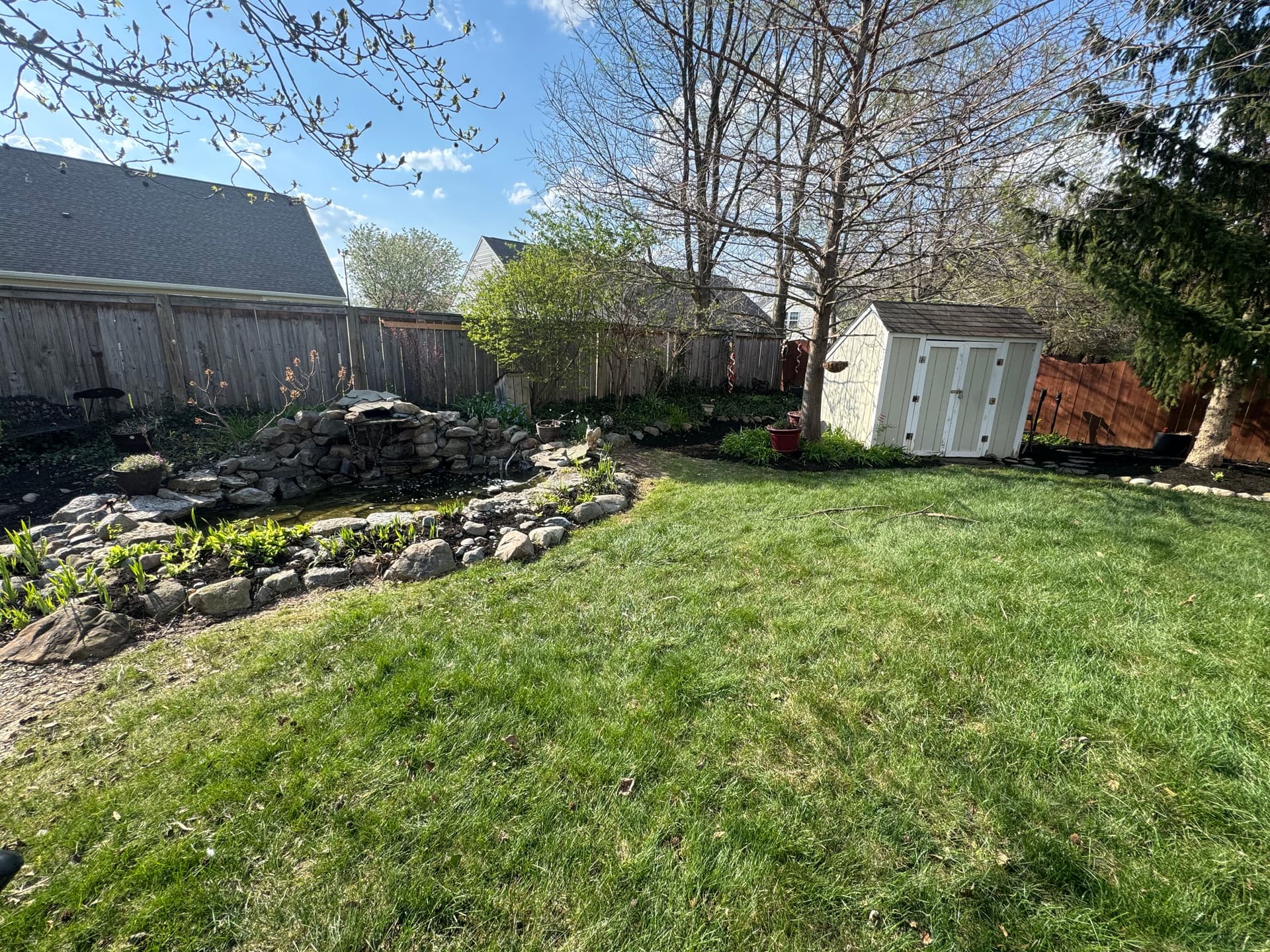 Spring Backyard Cleanup With Fresh Mulch and Plant Care image